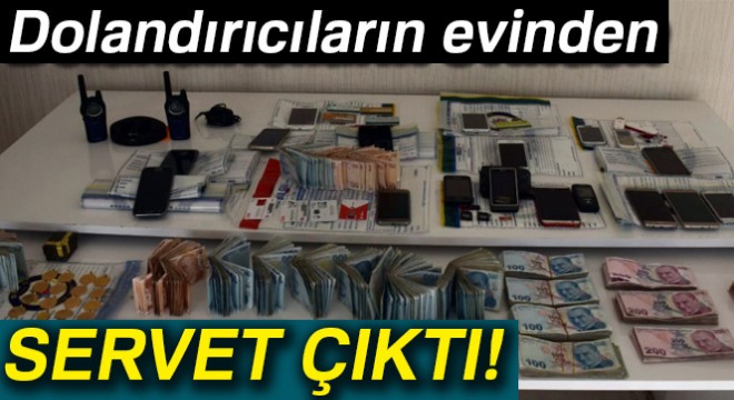 Dolandırıcıların evinden servet çıktı