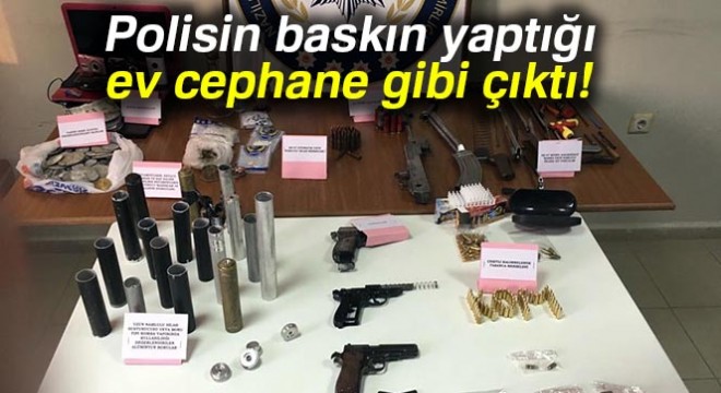 Polisin baskın yaptığı ev cephane gibi çıktı